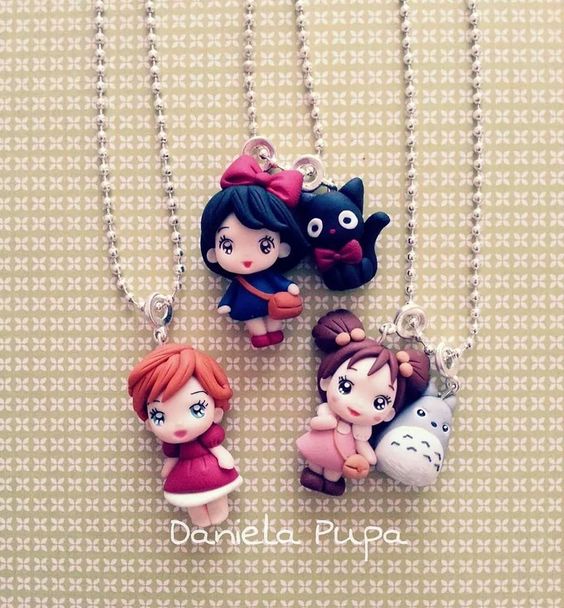 Polymer clay doll pendants