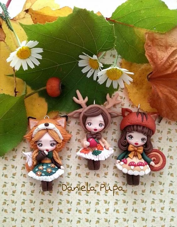 Polymer clay doll pendants