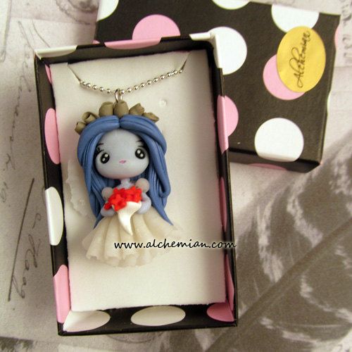 Polymer clay doll pendants