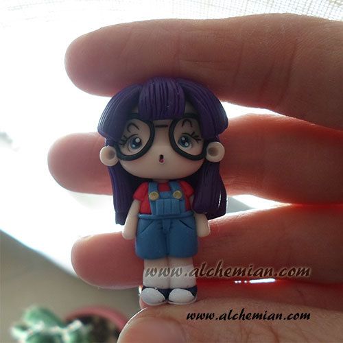 Polymer clay doll pendants