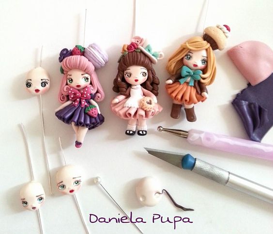 polymer clay doll pendant