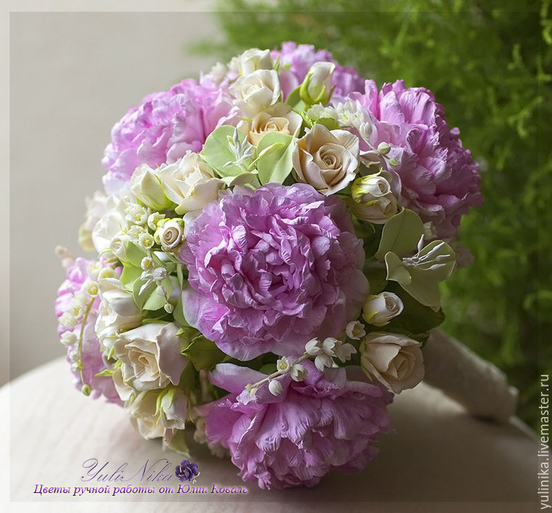 Bouquet of the bride with peonies