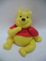 Check this Polymer clay Winnie the Pooh tutorial, you might like it!