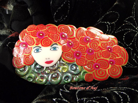 Brooch. Beautiful going out tonight. Brooch made of polymer clay. With a pretty gift bag. Face polymer clay brooches