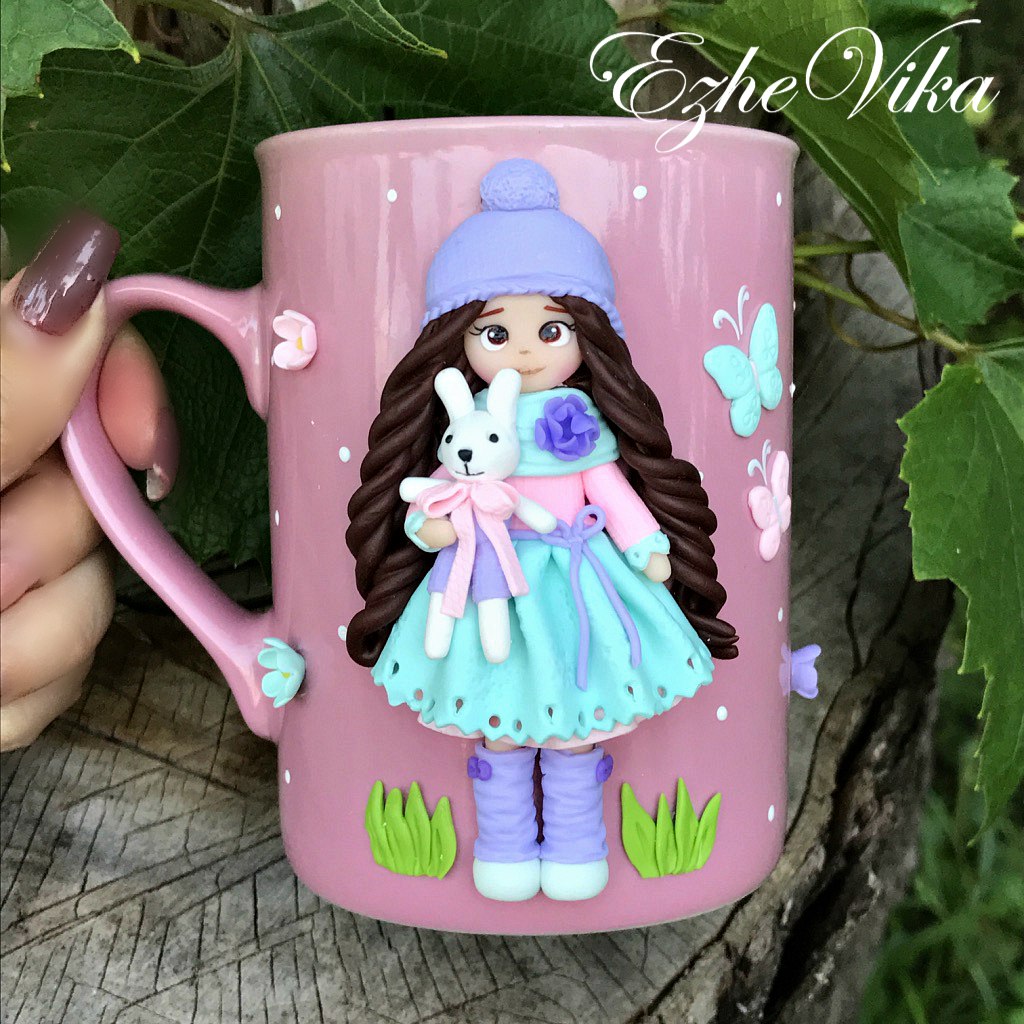 Mugs decorated with polymer clay