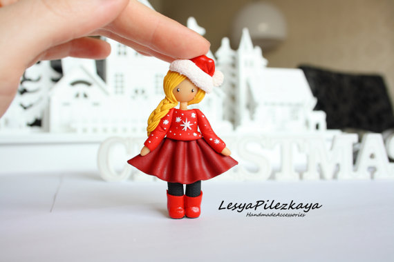 Polymer clay brooch with little girl in red Christmas clothing - Christmas jewelry