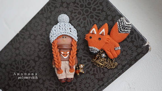 Polymer clay double brooches - dolls with a toy