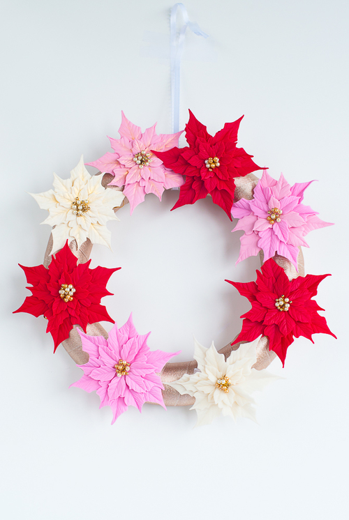 Polymer clay Christmas decorations with poinsettias