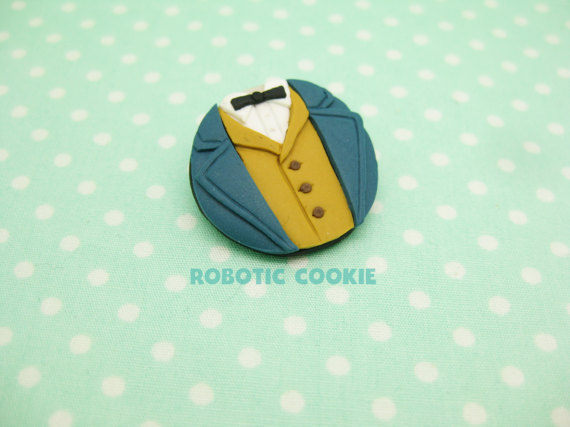The Magizoologist Brooch Pin Polymer Clay, Brooch, Newt Scamander Brooch, Fantastic Beasts Brooch, Harry Potter Brooch, Fandom Brooch Pin. Brooch Pin based on the character of Newt Scamander from Fantastic Beasts.