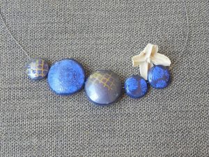 One of a kind polymer clay blue and gold necklace