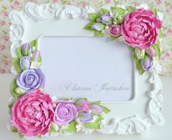 Check this Polymer clay flowers picture frame, you might like it!