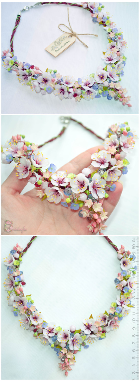 Exclusive handmade flower necklace with blooming apricot flowers, tiny blue and green-yellow forget me not and crystal beads.