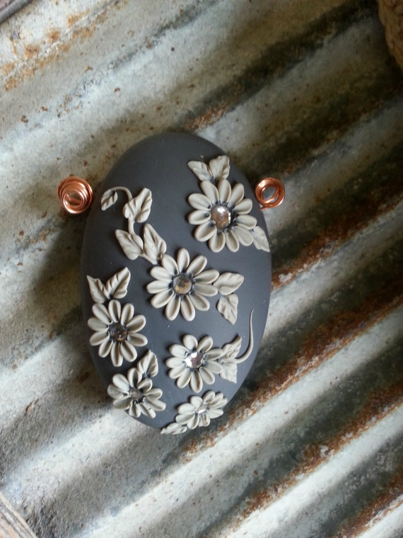 Large oval handcrafted polymer clay focal pendant bead with Pale grey on steel grey.