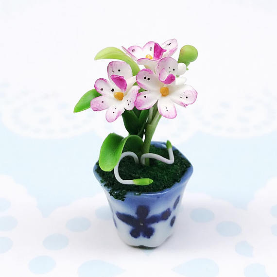 Polymer clay miniature flowers in pots