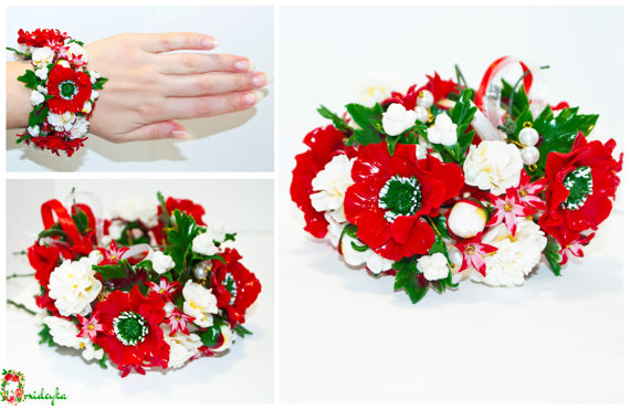 A polymer clay floral bracelets with a saturated red poppy with green stamen, delicate white flower, button of peonies and white lilac.