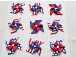 Finished red, white and blue polymer clay pinwheels
