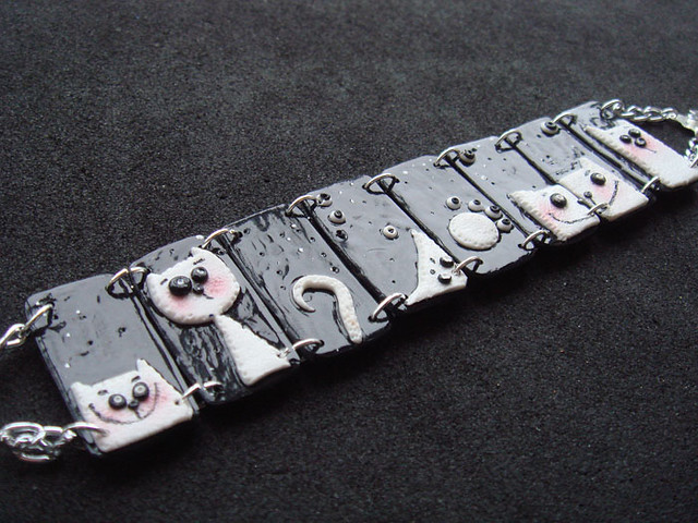 black polymer clay bracelet with white cats